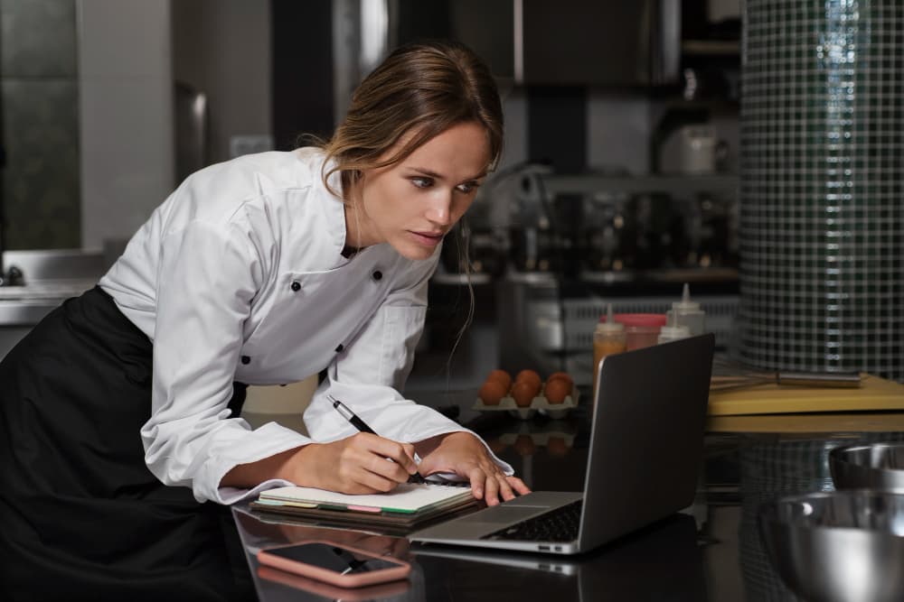 Restaurant website template preview displayed on desktop and mobile devices